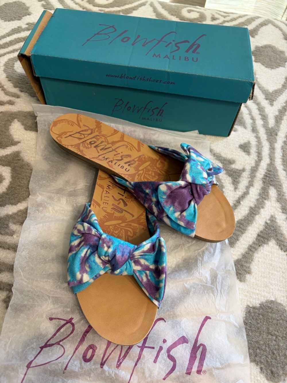 Blowfish Tie-Dye Bow Slide Sandals in Blue and Purple